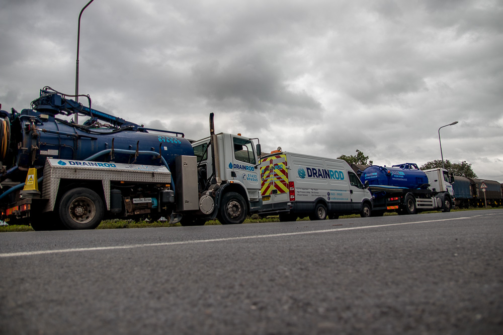 Drainrod ltd vehicles at a commercial site in Cardiff, South Wales cleaning blocked drains and septic tank maintenance